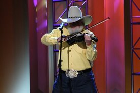 Charlie Daniels performs on the Crook and Chase show on RFD-TV.
Copyright Jim Owens Entertainment.
Photo by Karen Will Rogers.