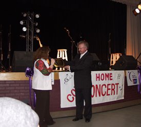 Charlie Chase is presented with a plaque in Rogersville, TN   Photo by Cassandra Mosley of the Rogersville Review