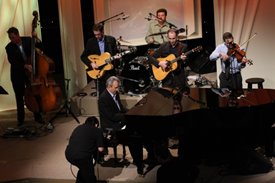 Buck White plays piano with The Whites' band on the Crook and Chase show on RFD-TV.
Copyright Jim Owens Entertainment.
Photo by Karen Will Rogers.