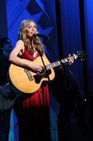 Jennifer Hanson performs on the Crook & Chase show on RFD-TV. 
Copyright Jim Owens Entertainment. Photo by Karen Will Rogers.