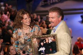 Lorianne and Charlie introduce Ray Stevens from the studio's balcony. The picture they are holding came from a fan at the show that attended the "old" Crook and Chase show on TNN. 
Copyright Jim Owens Entertainment.
Photo by Karen Will Rogers.