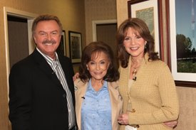 Charlie and Lorianne with Loretta Lynn after the Crook and Chase show on RFD-TV. 
Copyright Jim Owens Entertainment.
Photo by Karen Will Rogers.