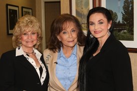 Peggy Sue, Loretta Lynn and Crystal Gayle backstage after the Crook and Chase show on RFD-TV. 
Copyright Jim Owens Entertainment.
Photo by Karen Will Rogers.