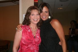 Lorianne and Sara Evans enjoy a hug backstage at the taping of the 2008 CMA Celebrity Close Up. Photo by Renee Behrman-Greiman.