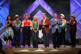 Lorianne and Charlie along with their guests thank the audience on the Crook and Chase show on RFD-TV. 
Copyright Jim Owens Entertainment.
Photo by Karen Will Rogers.