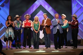 Lorianne and Charlie along with their guests thank the audience on the Crook and Chase show on RFD-TV. 
Copyright Jim Owens Entertainment.
Photo by Karen Will Rogers.
