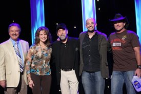 Charlie, Lorianne, Ray Stevens, Phil Stacey and Keith Anderson (left to right)pose for audience photos after the Crook and Chase show on RFD-TV.
Copyright Jim Owens Entertainment.
Photo by Karen Will Rogers.