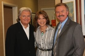 Lorianne and Charlie with Ricky Skaggs after the Crook and Chase show on RFD-TV.
Copyright Jim Owens Entertainment.
Photo by Karen Will Rogers.