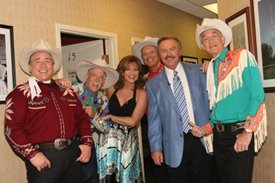 Lorianne and Charlie with Riders in the Sky after the Crook and Chase show on RFD-TV. 
Copyright Jim Owens Entertainment.
Photo by Karen Will Rogers.