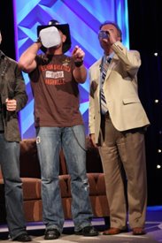 Keith Anderson and Charlie have a drink on the Crook and Chase show on RFD-TV.
Copyright Jim Owens Entertainment.
Photo by Karen Will Rogers.