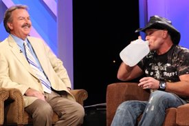 Keith Anderson takes a drink of water on the Crook and Chase show on RFD-TV.
Copyright Jim Owens Entertainment.
Photo by Karen Will Rogers.