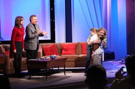 Bucky Covington getting a hug and some flowers from one of his biggest fans on CROOK & CHASE ON RFD-TV 
@Jim Owens Entertainment, Inc.
Photo by: Karen Will Rogers
