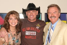 Keith Anderson with Lorianne and Charlie after the Crook and Chase show on RFD-TV.
Copyright Jim Owens Entertainment.
Photo by Karen Will Rogers.