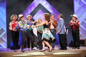 Lorianne and Too Slim dance on the Crook and Chase show on RFD-TV. 
Copyright Jim Owens Entertainment.
Photo by Karen Will Rogers.